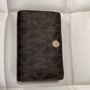 Small brown MK wallet